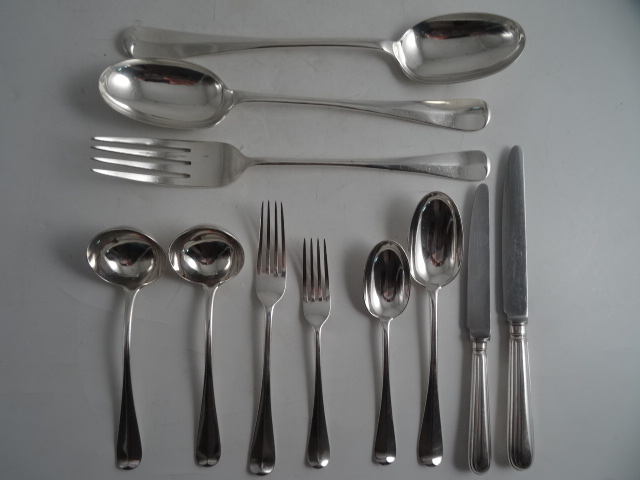 A VICTORIAN SILVER RAT TAIL PATTERN TABLE FLATWARE SERVICE for twelve, London 1890 H & Co.,