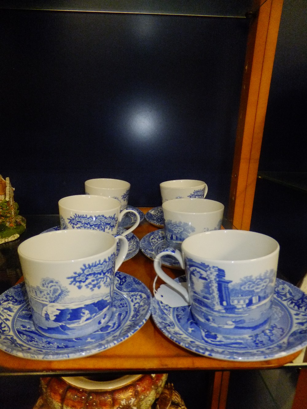 Six Spode blue and white cups and saucers with panoramic scenes