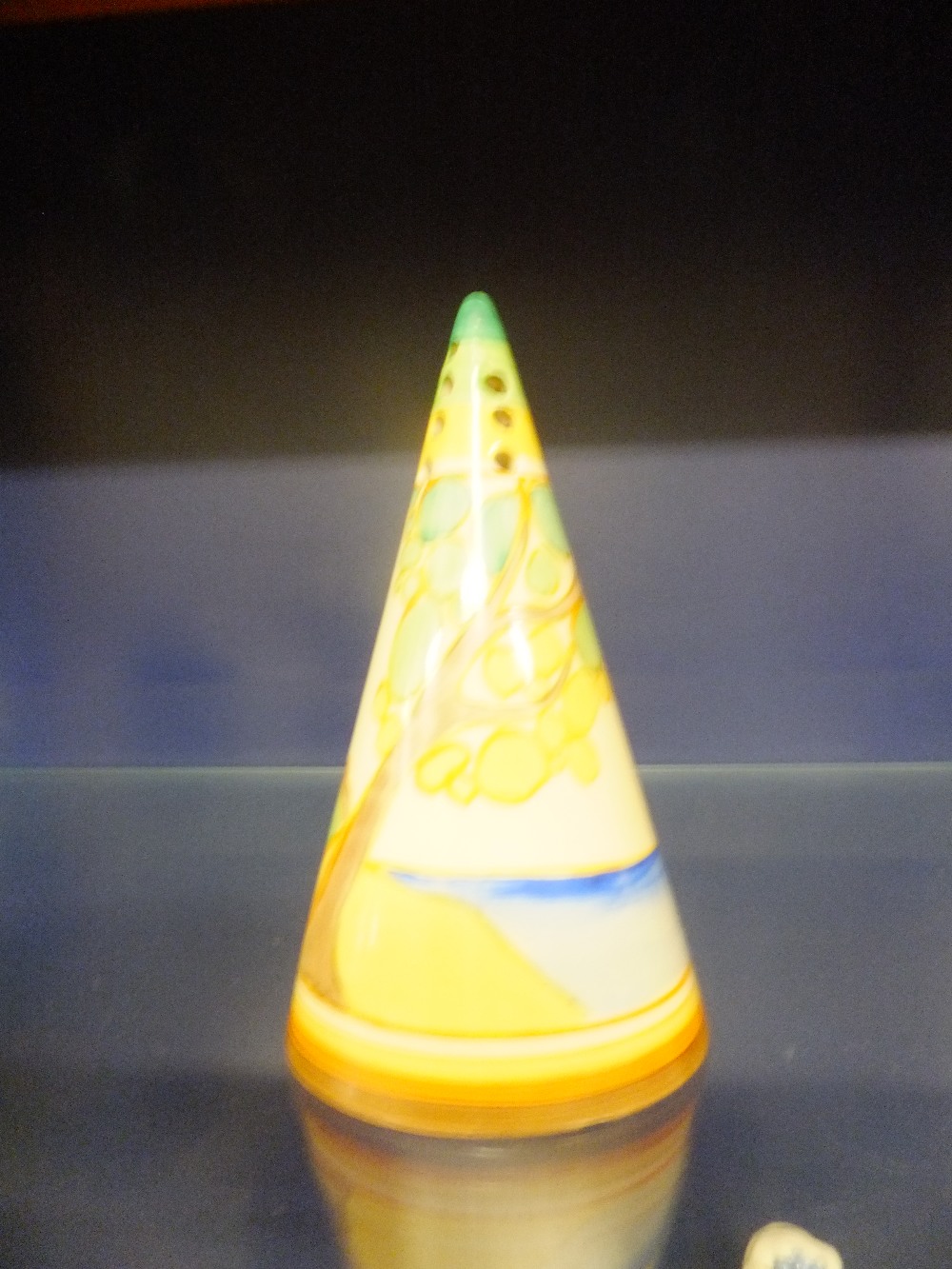 A vintage Clarice Cliff  conical shaker from the "Secrets" series some damage to under base