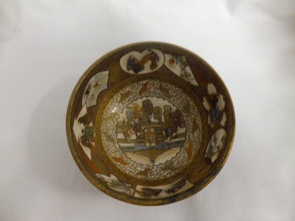 A Kozan Satsuma bowl having numerous pictorial panels, character stamp to base 5" diameter