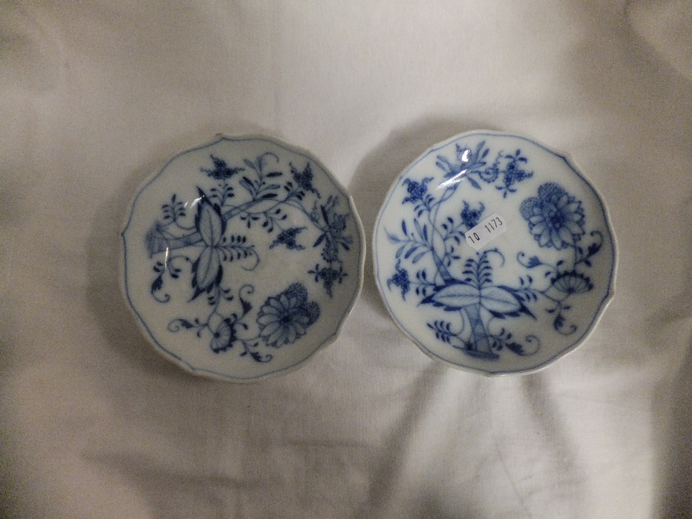 A pair of Meissen blue and white shallow dishes with floral decoration