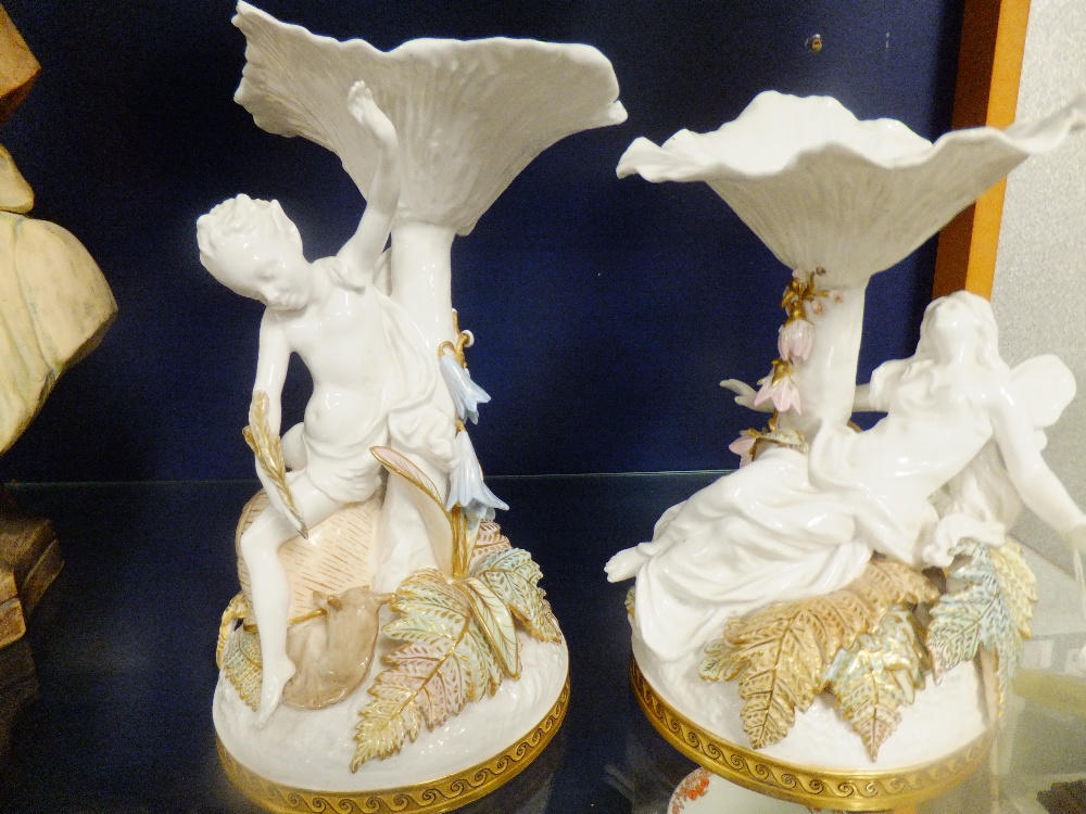 A pair of Copeland for T Good & Co figurines "Puck" & "Titania"