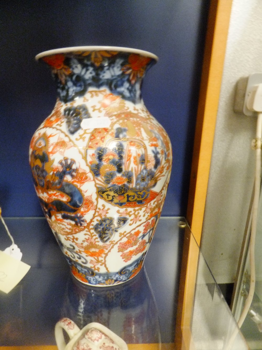 An impressive Japanese Imari hand painted vase with signed character marks to baser 26cm tall