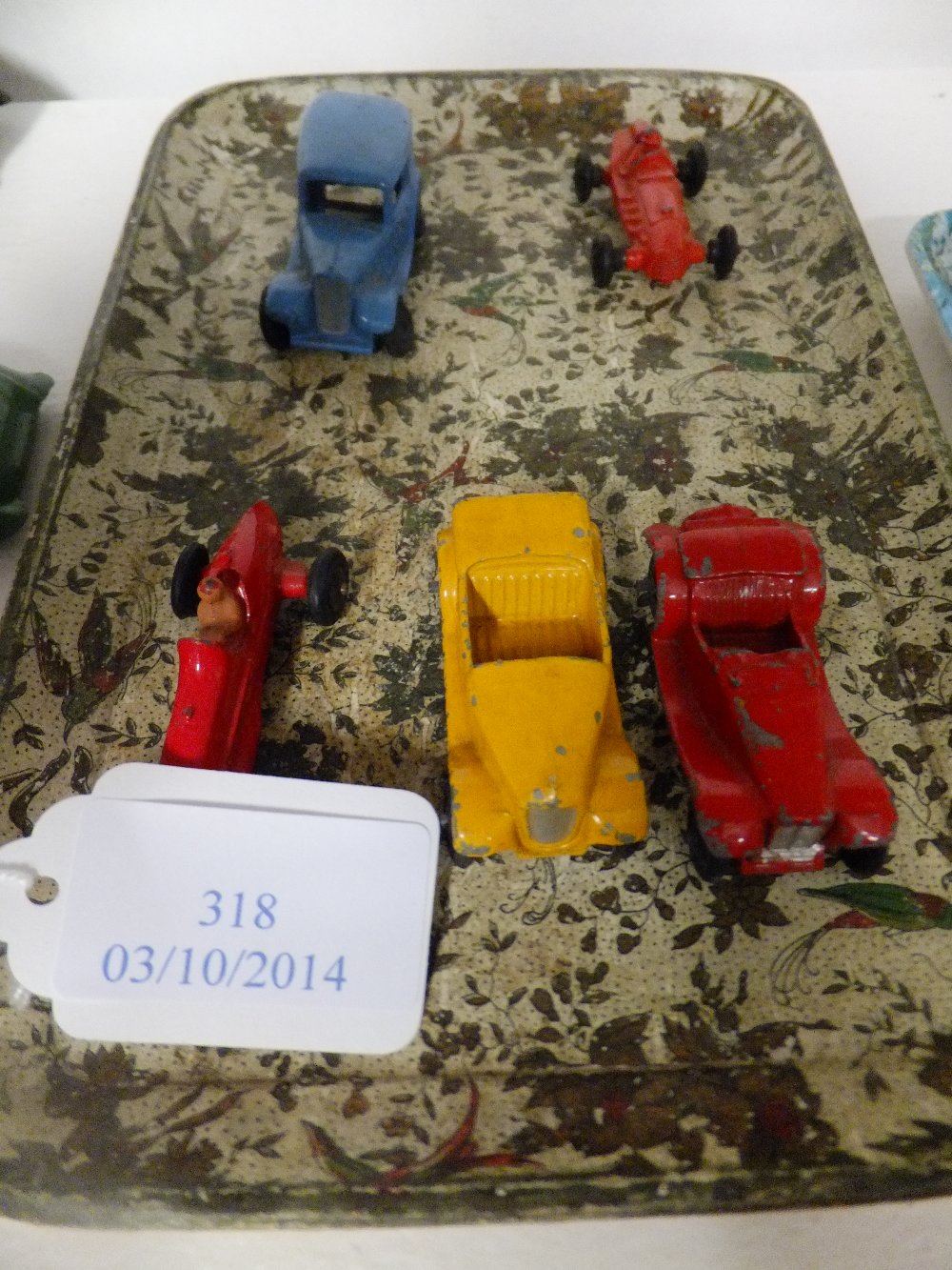 Five miniature Dinky play-worn cars