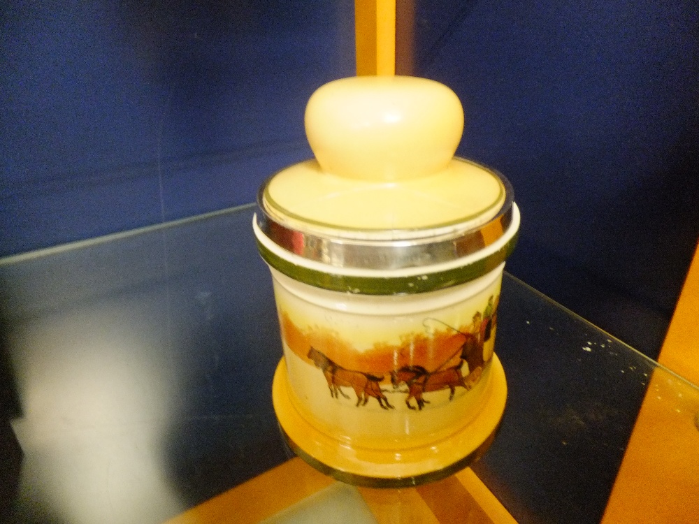 A Royal Doulton Series Ware Coaching scene tobacco jar, having silver rim, marks to base No D2716