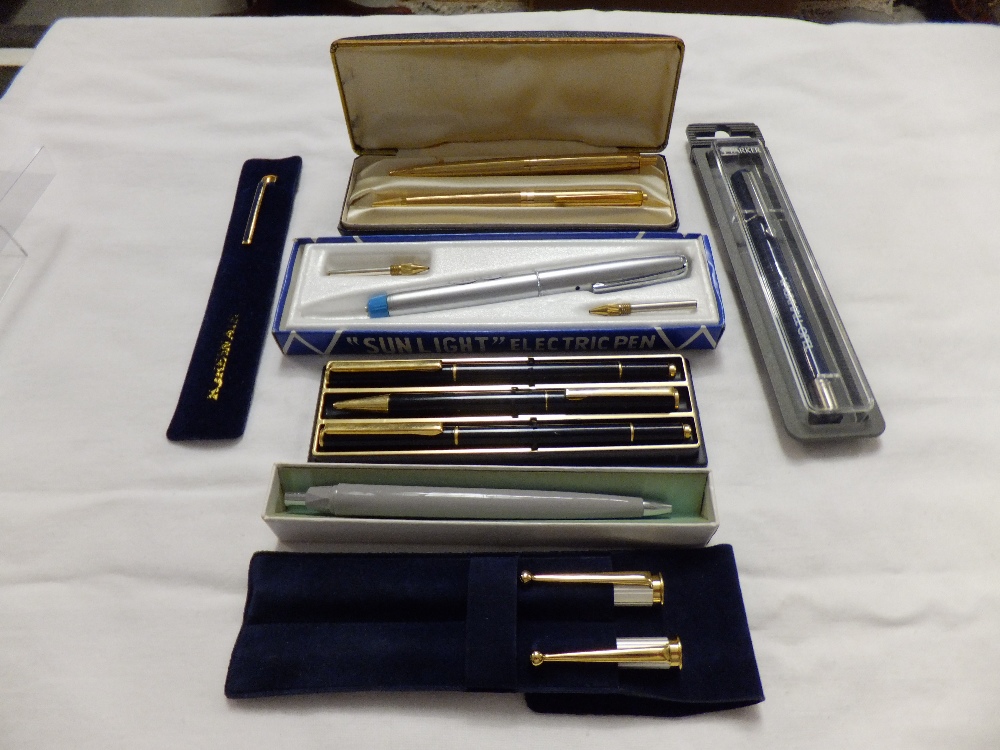 A mixed selection of boxed pens to include a Parker Vauxhall-Opel ball point pen, an Air France
