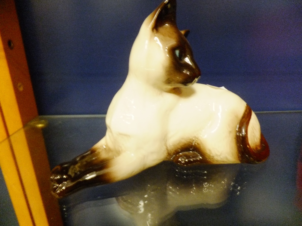 A Beswick "Siamese cat" cream and brow high gloss finish, marks to base No 1558