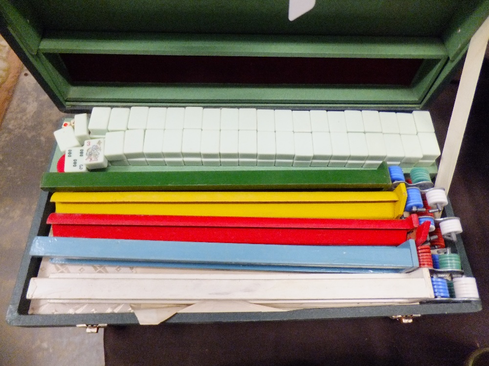 A vintage boxed include Mah Jong set