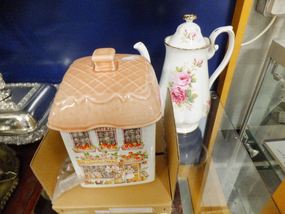 A Royal Albert 'American Beauty' coffee pot and a Sadler "The Country Store" biscuit barrel