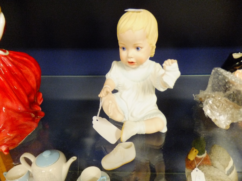 A Lenox baby book collection figurine "Baby's First Shoes"