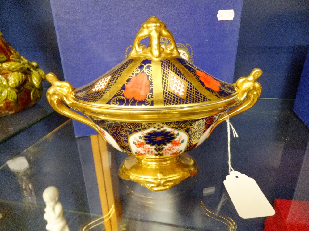 A Royal Crown Derby sauce tureen having Imari pattern, marks to base and inside lid, boxed