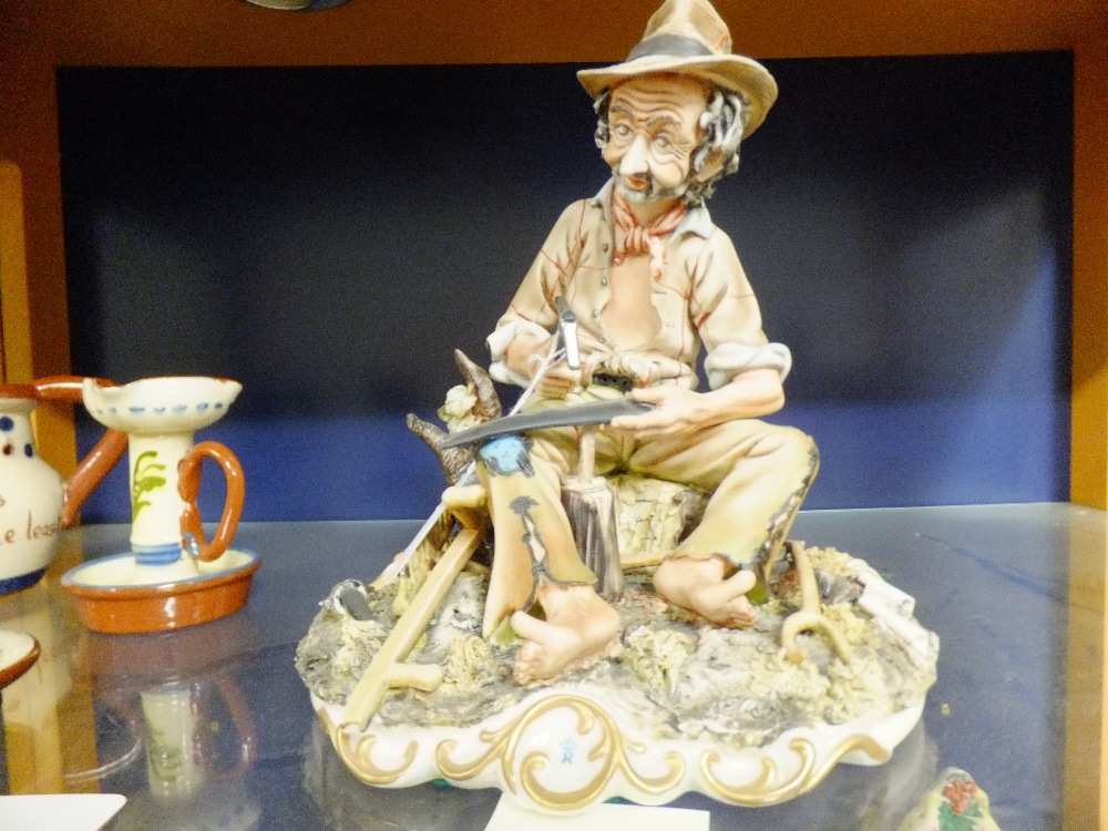 A Capodimonte figure of a "Tramp"