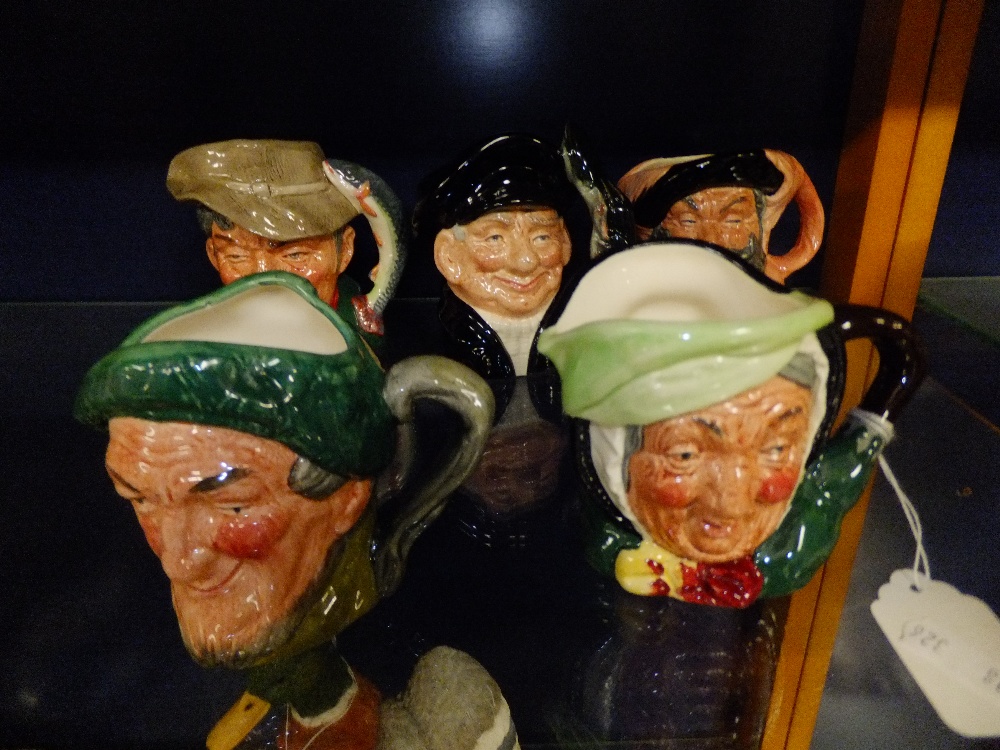 Five Royal Doulton character jugs to include "The Poacher" D6464, "Auld Mac" D5824, "Sairey Gamp"