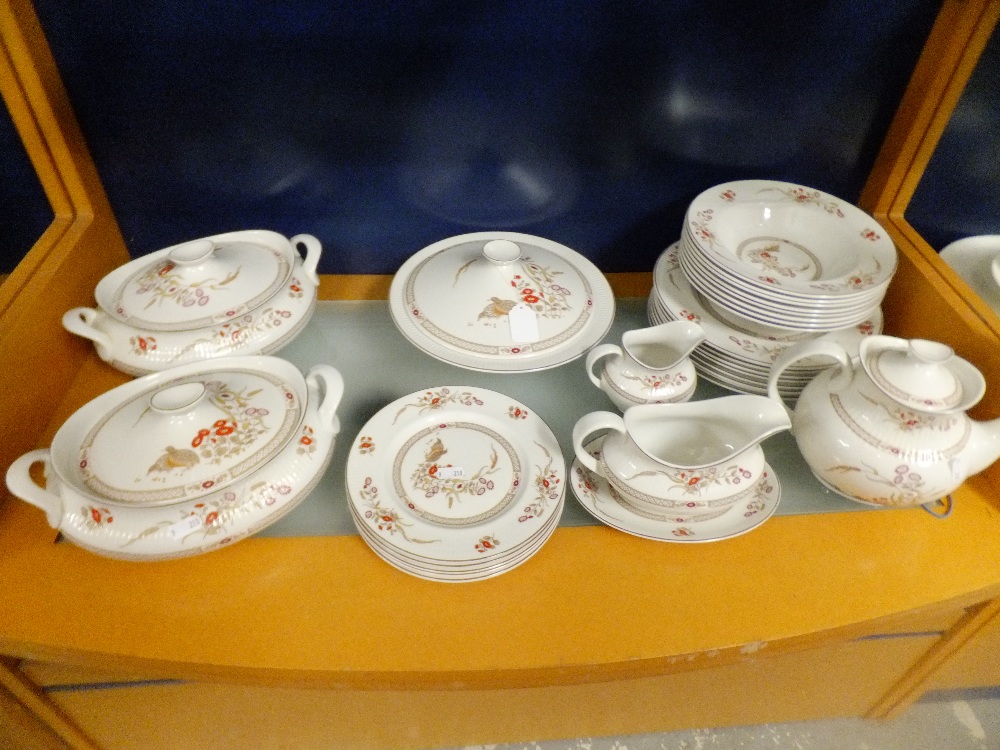 A Royal Doulton Russet Glen part tea-dinner service comprising of plates, bowls, tureens, gravy