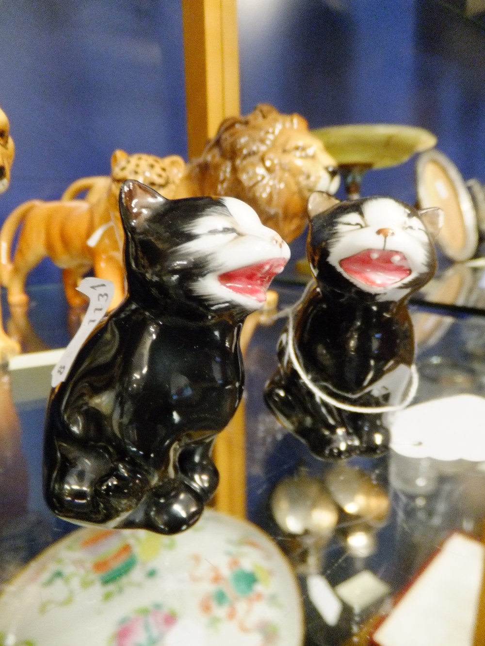 Two Royal Doulton "Lucky" yawning cats, marks to base