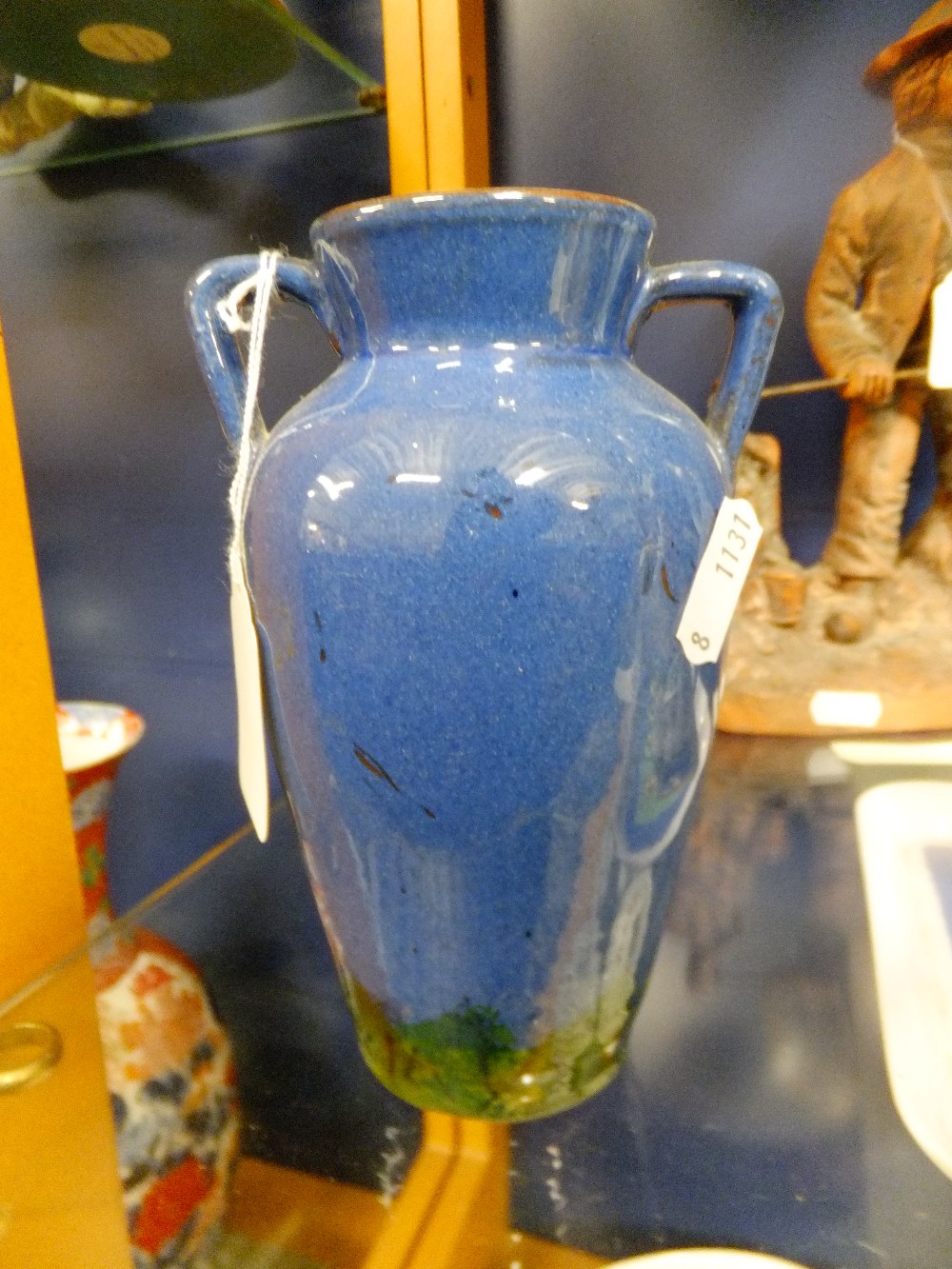 A Torquay pottery two-handled vase have "kingfisher" design to front