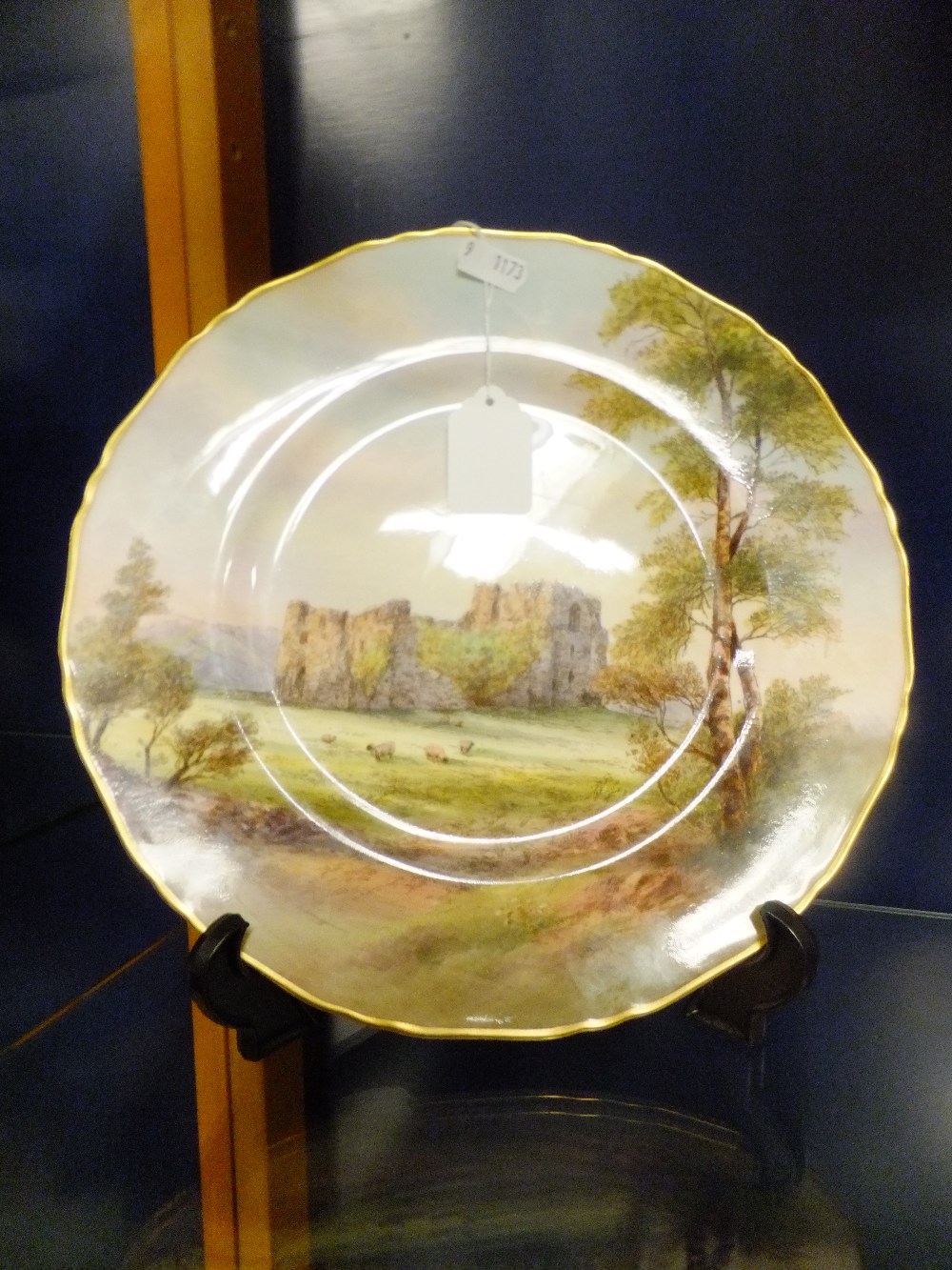 A Royal Worcester cabinet plate signed R.RUSHTON 18cm dia