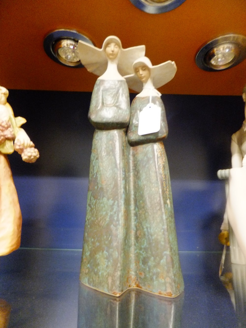 A Lladro figurine of two 'Nuns', marks to base