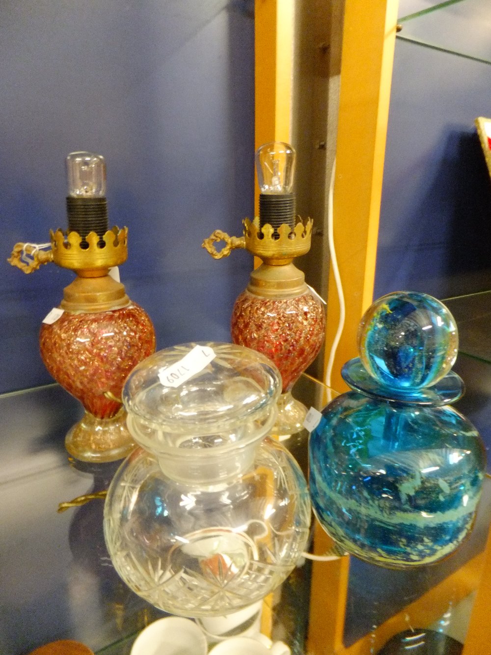 A Mdina glass perfume bottle, a pair of Murano glass lamps and a jar