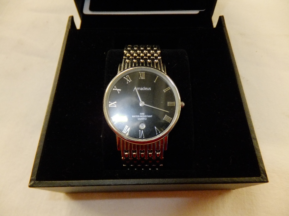 A boxed gents Amadeus silver coloured 50M water resistant wristwatch with date function