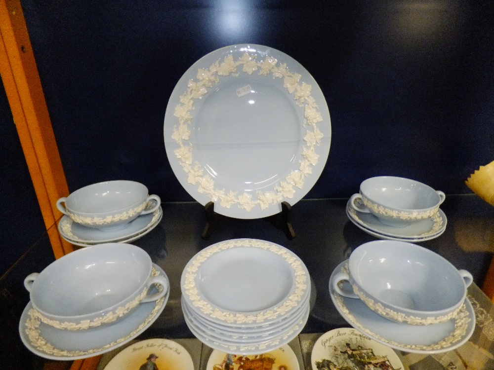 A selection of Wedgwood embossed 'Queens ware' china to include soup bowls, saucers and plates