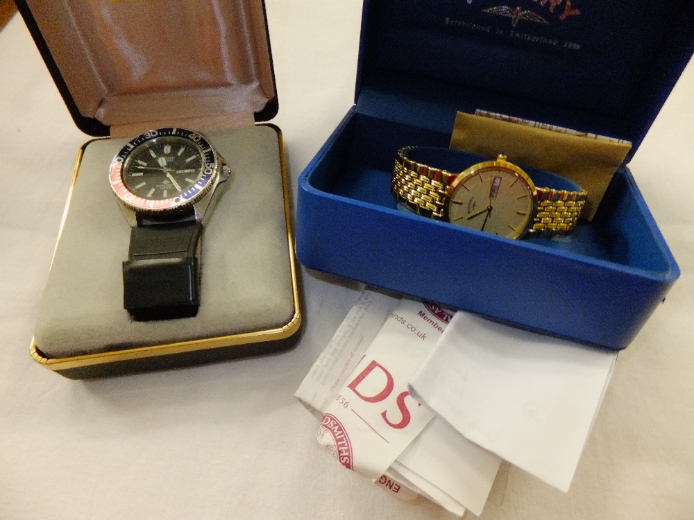 A boxed gents Citizen wristwatch and a boxed gents gold coloured Billet watch