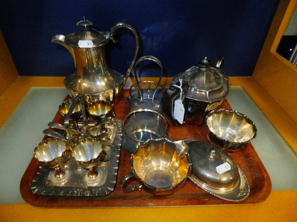 A good quality silver plated tea set, an egg cruet and butter dish etc