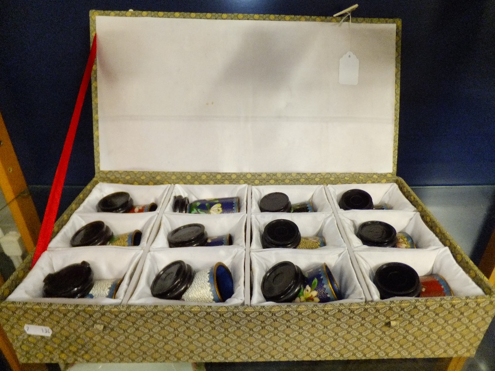 A set of twelve boxed miniature cloisonne vases with stands