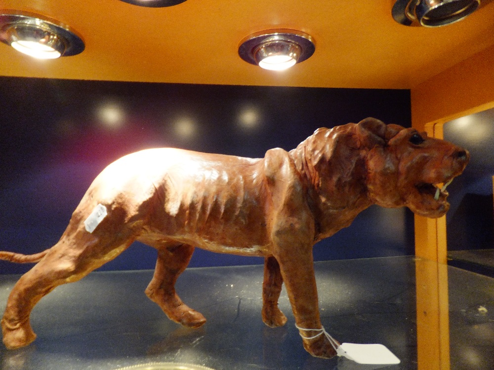 A leather figurine of a Lioness