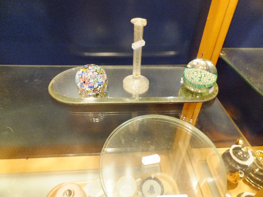 Two Millefiori paperweights, two glass stands and a mirror