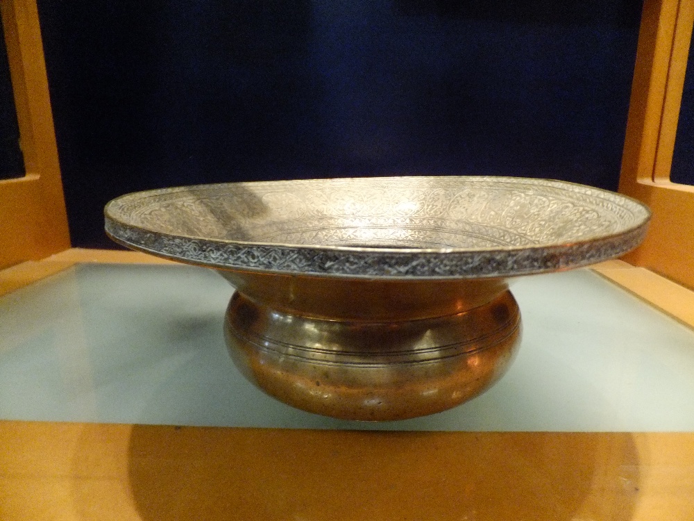 A 19th C Middle Eastern bronze spittoon with engraved panel decoration