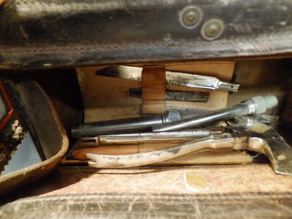 An Air Ministry motorcycle tool kit dated 1939 in original leather box