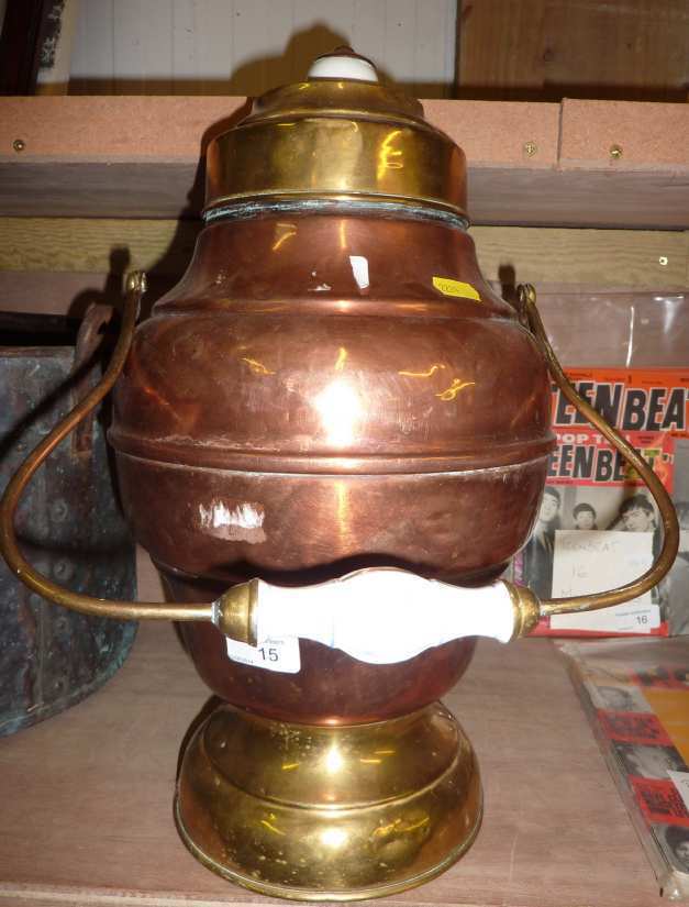 Copper and brass lidded urn with ceramic knob