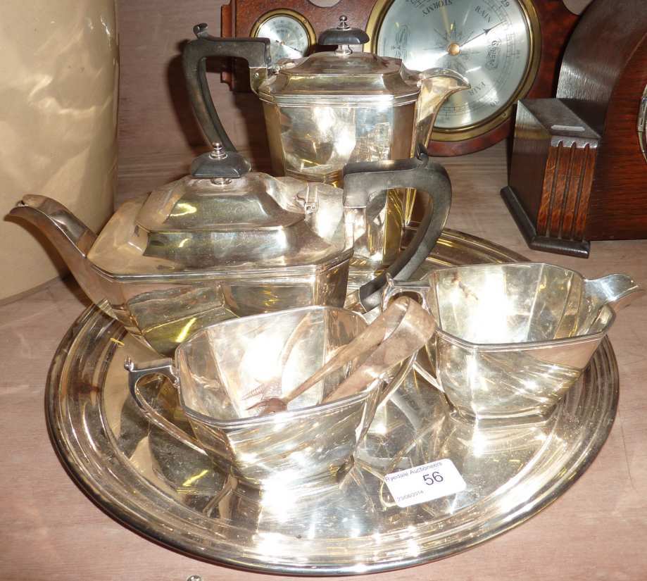 4 piece silver plated Art Deco style tea set on tray and a pair of silver plated sugar nips