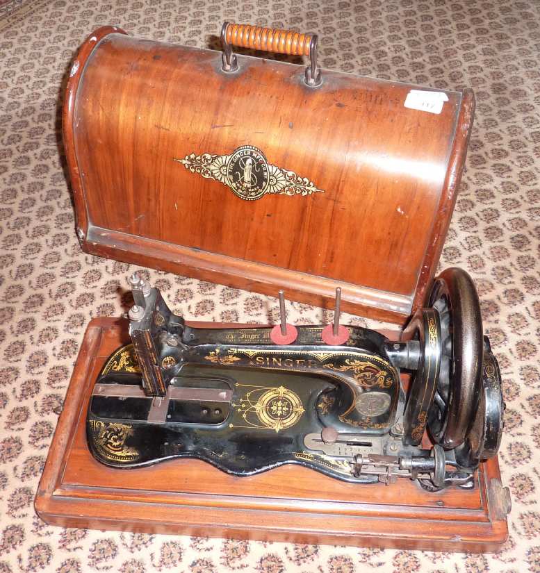 Cased early Singer sewing machine