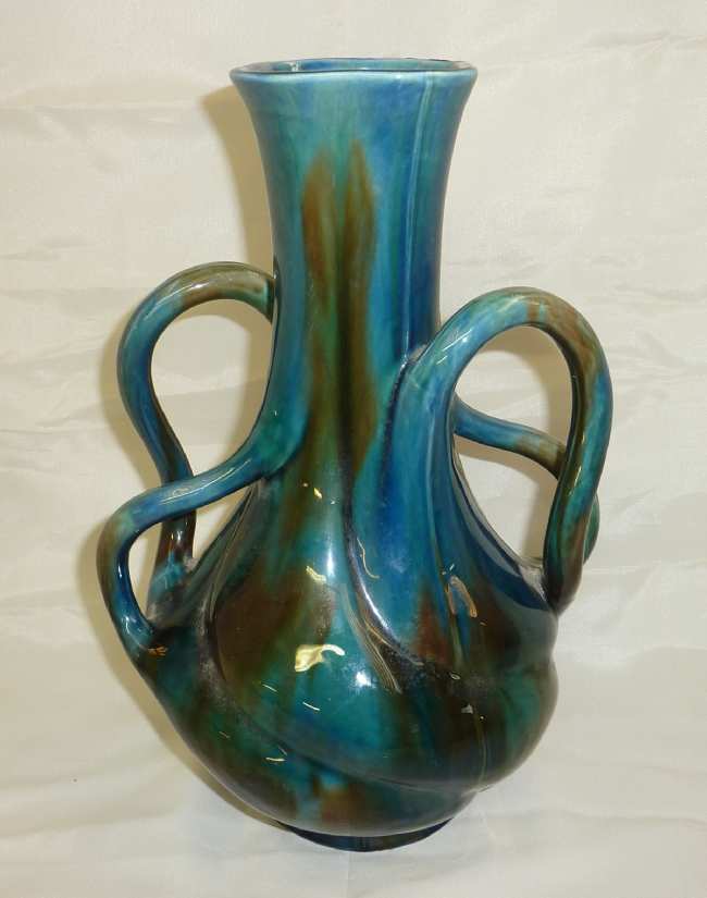 Studio ware mottle glazed vase with impressed marks to the base J.Mei?hold (30cm high)