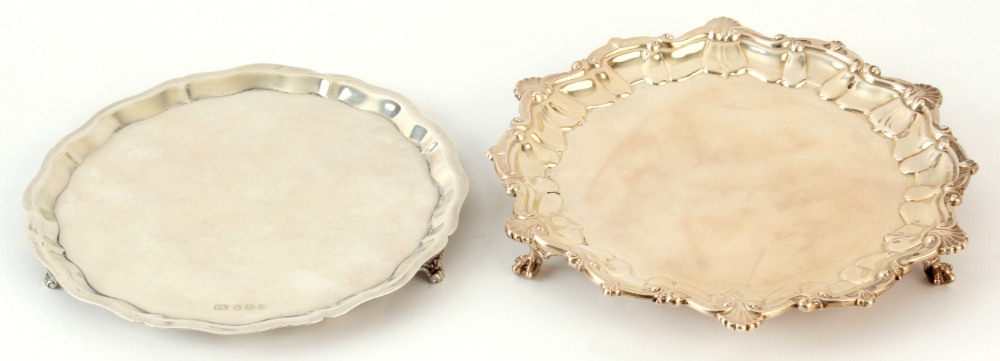 Property of a deceased estate - an early C20th silver salver with `C`-scroll & shell border, on