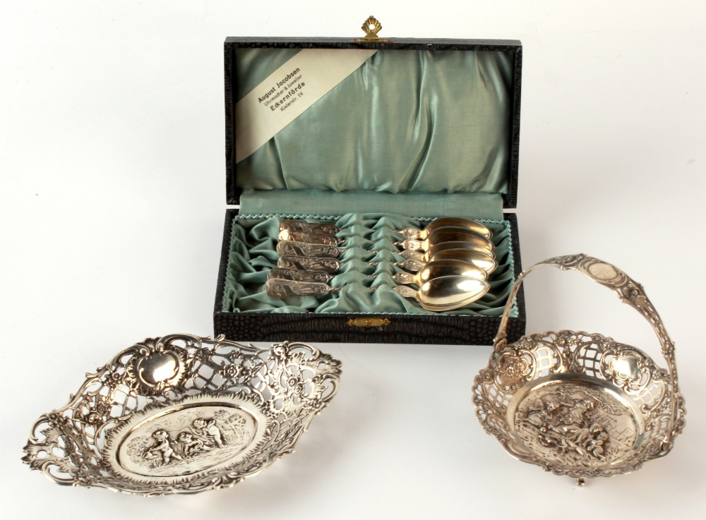 Property of a lady - two late C19th / early C20th German 800 grade silver baskets, one with swing