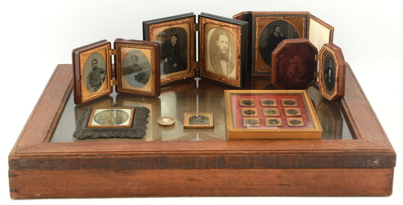 Property of a gentleman - a collection of C19th ambrotypes, some in cases, all in an oak glazed