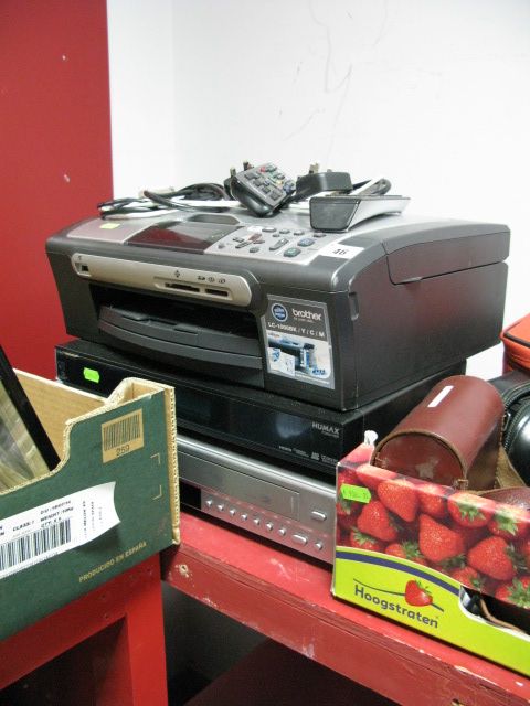 A Samsung Combination DVD/VHS Player, a Brother scanner/copier and a Humax Freesat. Sold for