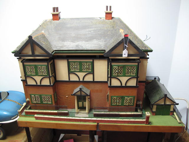 A Large 1930`s Wooden Dolls House, double fronted mock Tudor style, rooms to both front and rear,