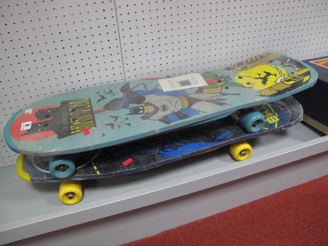 Two Modern `Batman` Related Skate Boards, both with different covering pictures, both unused.