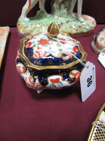 A Royal Crown Derby China Box and Cover, of shaped square form, printed, painted and gilt in the