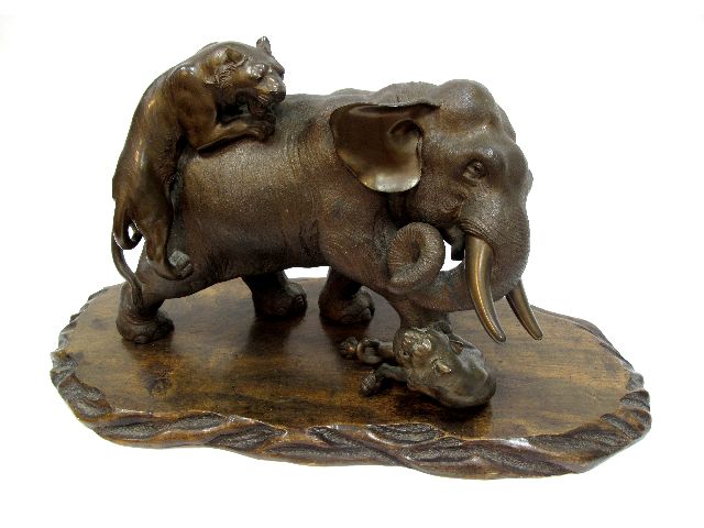 An Early XX Century Japanese Bronze Group, as an elephant attacked by two tigers, square seal mark