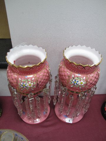 A Pair of Victorian Pink Glass Lustres, enamelled and gilt with alternating floral and hatched