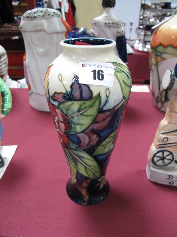 A Moorcroft Simeon Design Vase by Philip Gibson, of tall baluster form, decorated with red and