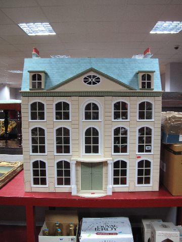 A Large Modern Dolls House, in the style of a Georgian mansion, with double front opening doors to