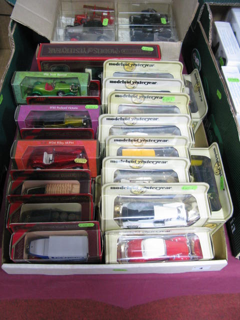 Thirty One Boxed Matchbox Models of Yesteryear, including three vehicle gift set. Some woodgrain