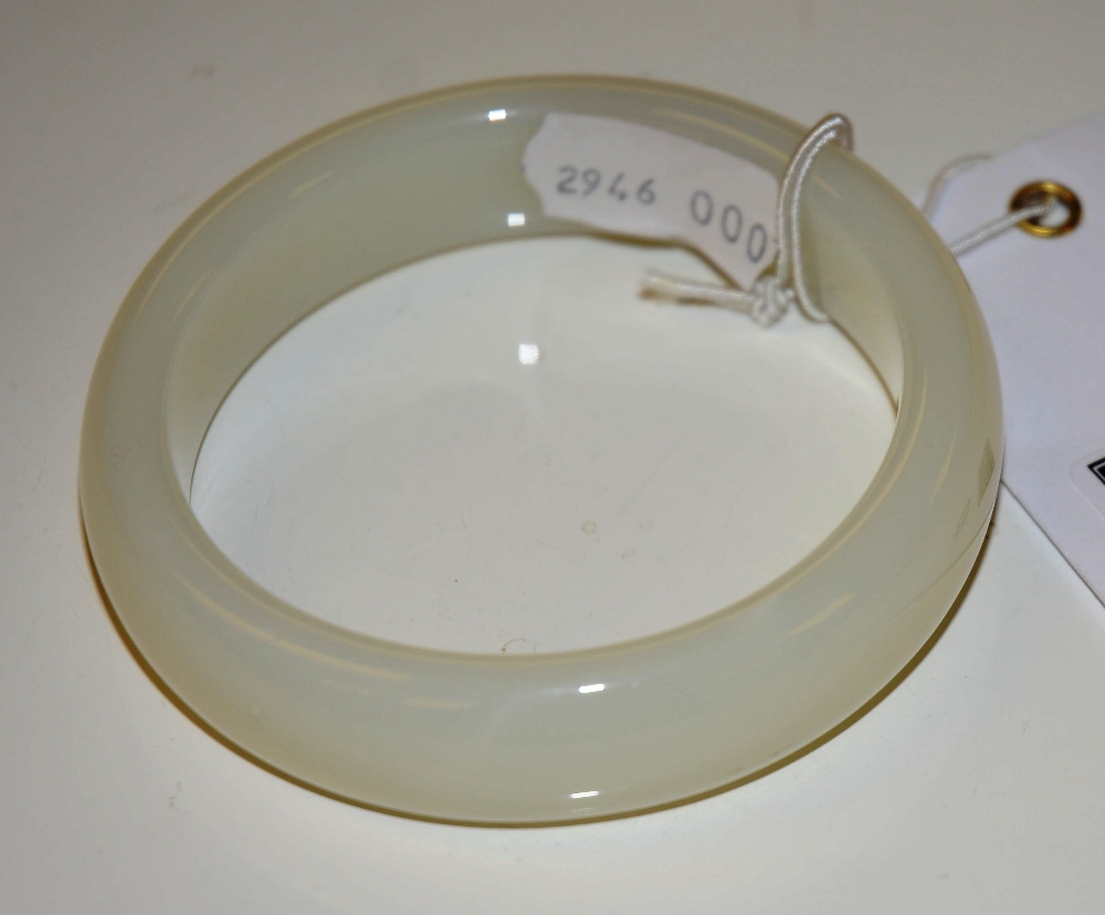 A Jadeite bangle, 7.5cm diameter