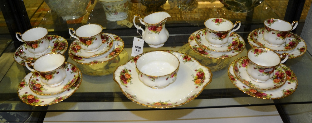 Part teaset in the 'Old Country Rose' pattern, comprising cups, saucers, side plates, cream jug